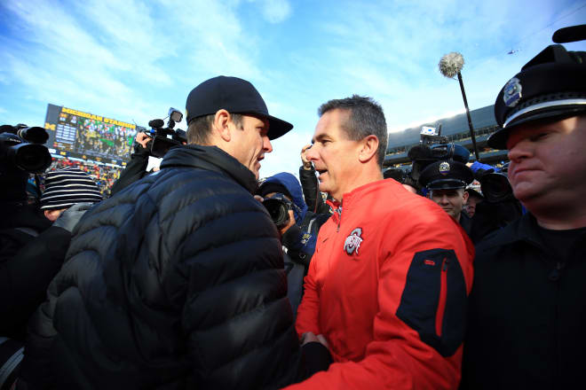 Jim Harbaugh (left) and Urban Meyer have their teams set up for big recruiting hauls in 2016.