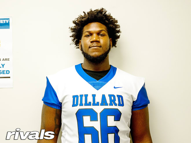 Three-star offensive lineman Rico Jackson of Fort Lauderdale (Fla.) Dillard High signed with NC State.