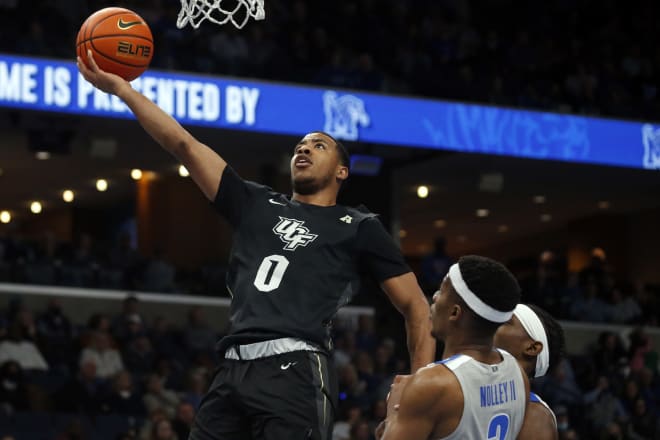 UCF Knights guard Darius Johnson (0) shoots during the second half against the Memphis Tigers at FedExForum. 