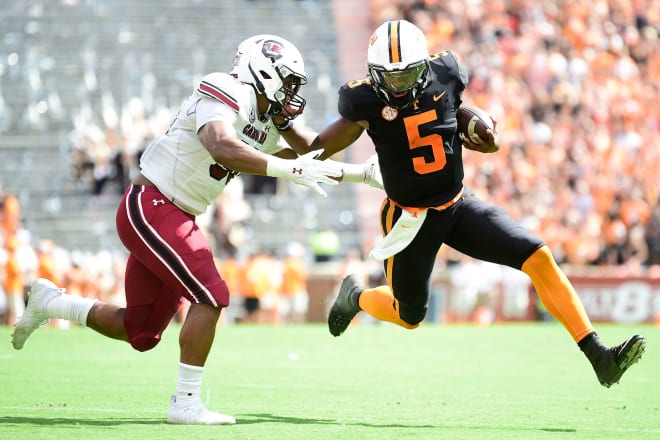 Tennessee quarterback Hendon Hooker tries to get past South Carolina's Damani Staley in last season's game at Neyland Stadium. 