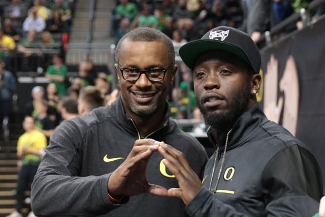 New Oregon coach Willie Taggart and former Duck star De'Anthony Thomas.