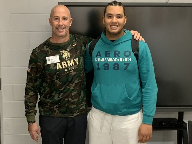 Army OC Brent Davis and OL prospect Elijah Haughawout during Friday's in-school visit