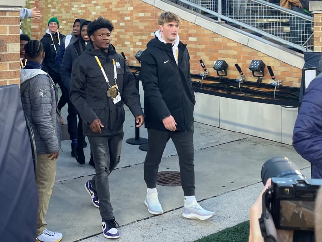 2023 three-star prospect Brandyn Hillman (left center) walks through the tunnel at Notre Dame Stadium before the Stanford game on Oct. 15. 