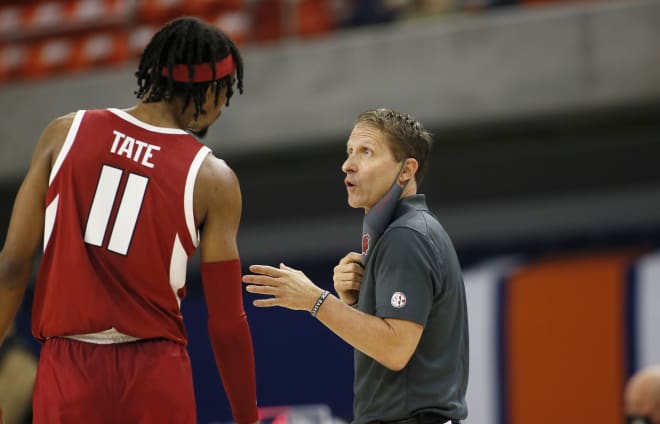 Former Razorback Jalen Tate and head coach Eric Musselman.