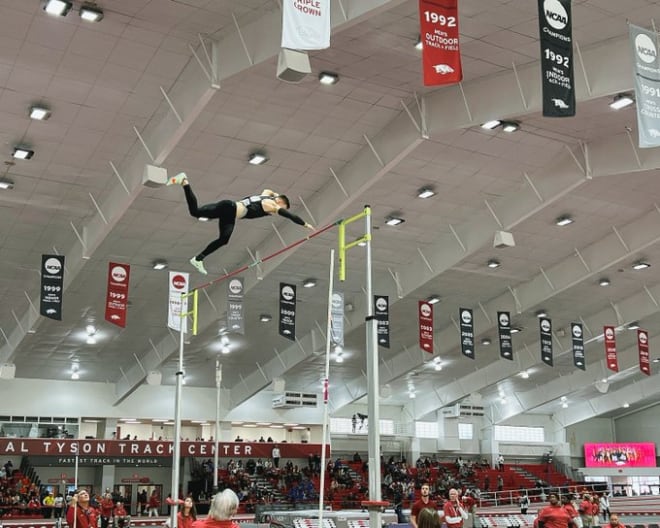 Peyton Haack soars through the air on a pole vault attempt. 