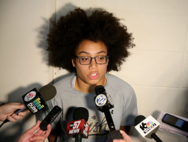 Recovering Notre Dame All-American Olivia Miles answers questions from the media on Irish women's basketball media day.