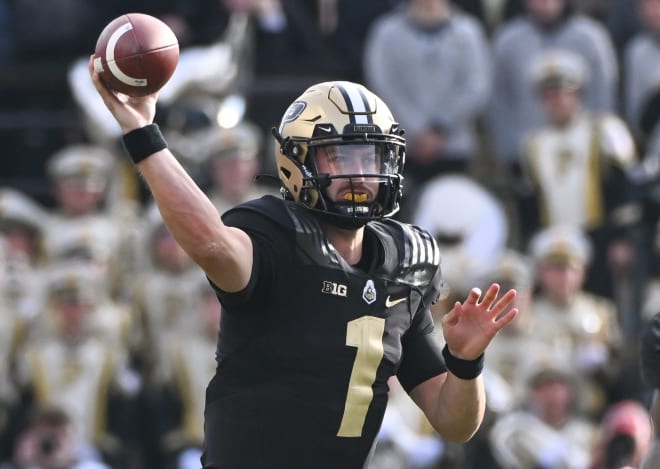 Nov 25, 2023; West Lafayette, Indiana, USA; Purdue Boilermakers quarterback Hudson Card (1) throws a pass during the second half at Ross-Ade Stadium. Mandatory Credit: Robert Goddin-USA TODAY Sports
