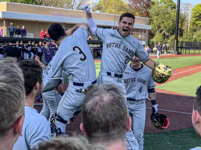 Notre Dame baseball player and center fielder, Spencer Myers (No. 2) jumping in celebration.