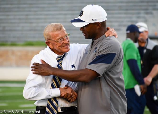 Lou Holtz and Notre Dame assistant coach Todd Lyght, a two-time consensus All-American for Holtz, greet each other at Irish Invasion.