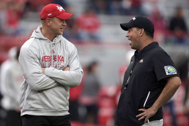 Ohio State head coach Ryan Day and Scott Frost both worked under Chip Kelly at one time in their careers.