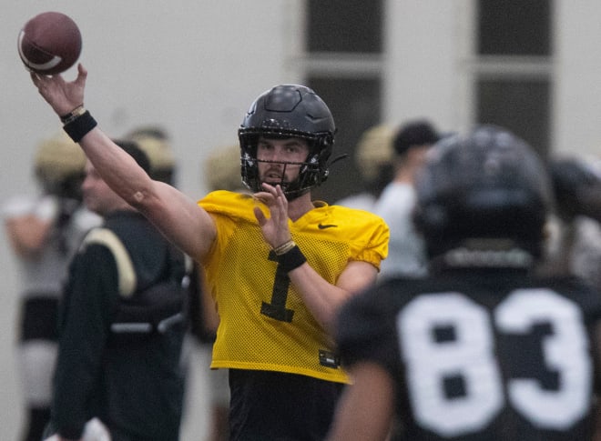 Purdue Boilermakers quarterback Hudson Card (1) throws the ball during spring football practice, Thursday, March 23, 2023, at Mollenkopf Athletic Center in West Lafayette, Ind.