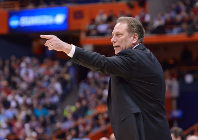 Michigan State Spartans head coach Tom Izzo gives instructions during the first half against the Oklahoma Sooners in the semifinals of the east regional of the 2015 NCAA Tournament at the Carrier Dome.