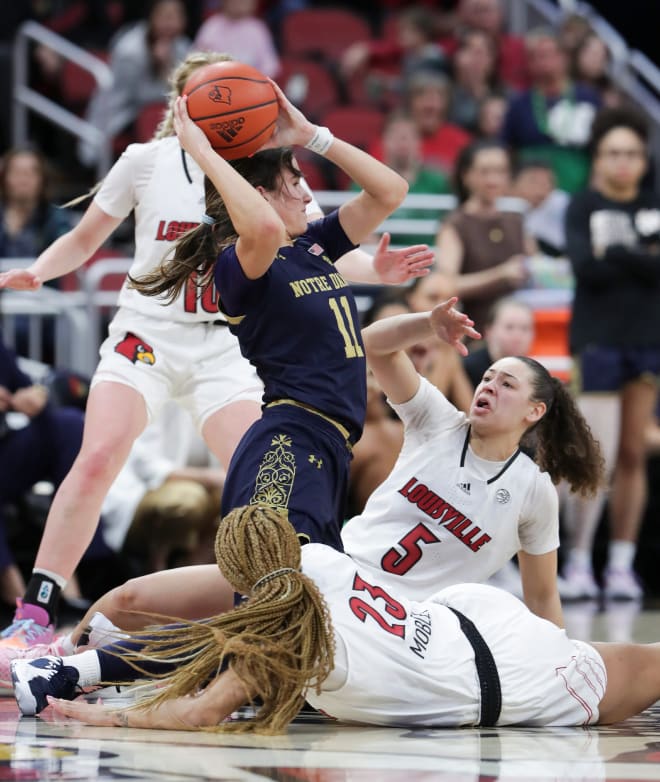 Notre Dame guard Sonia Citron, in blue, led the Irish to a hard-fought victory at Louisville after Olivia Miles was sidelined.