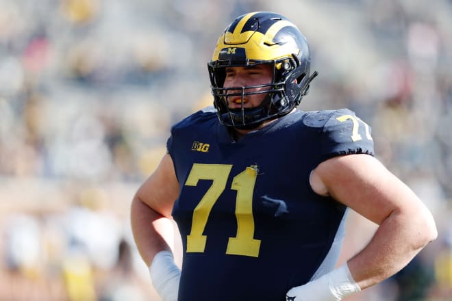 Michigan Wolverines football tackle Andrew Stueber will miss the season with an ACL injury. He started the Peach Bowl last year. 