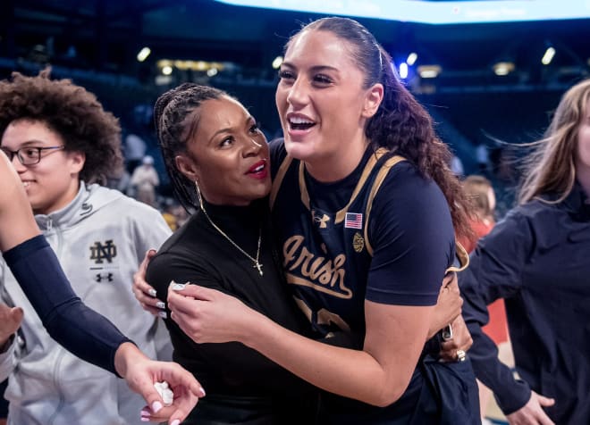 Notre Dame coach Niele Ivey and forward Kylee Watson celebrate a dominant performance by Watson in ND's 85-48 rout of Georgia Tech.