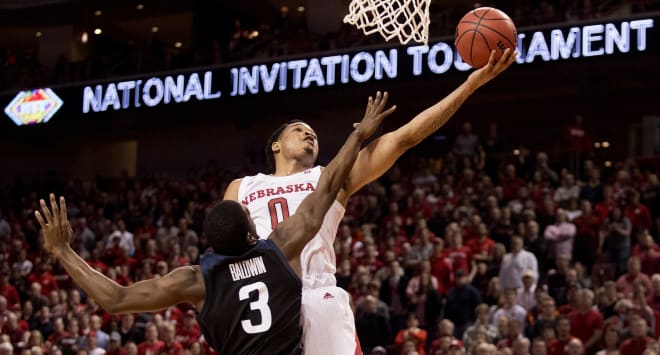 James Palmer scored 23 points as Nebraska held off a late Butler rally to advance to the second round of the NIT.