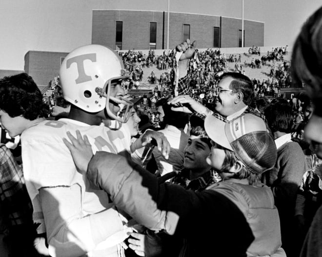 Tennessee's Willie Gault celebrates with fans following the Vols' 51-13 win over Vanderbilt in Nashville in 1980.
