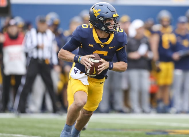 West Virginia is projected to win three of its remaining games
