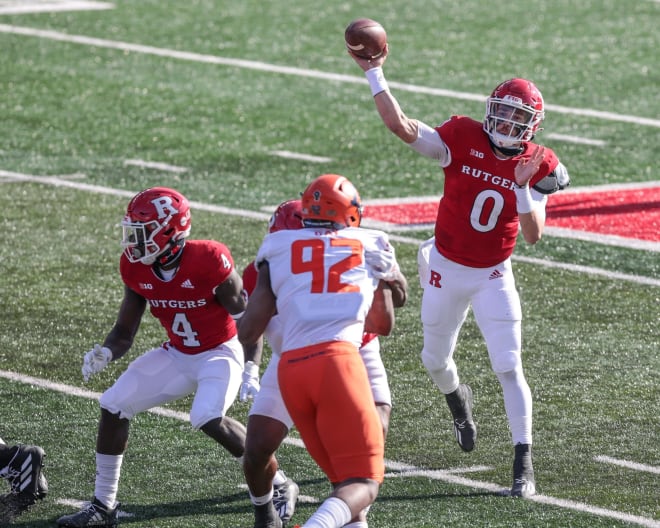 Nov 14, 2020; Piscataway, New Jersey, USA; Rutgers Scarlet Knights quarterback Noah Vedral (0) throws the ball as Illinois Fighting Illini defensive lineman Isaiah Gay (92) pass rushes during the first half at SHI Stadium.