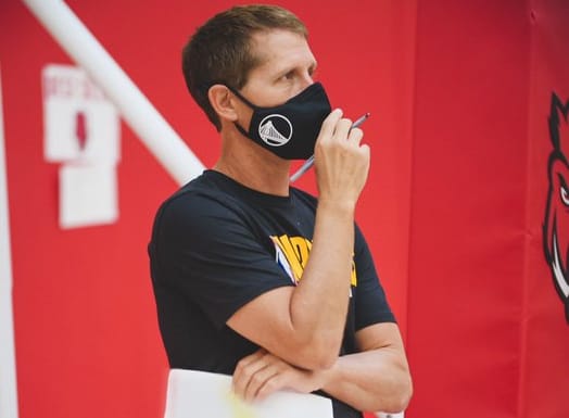 Arkansas head coach Eric Musselman man masked up for practice.