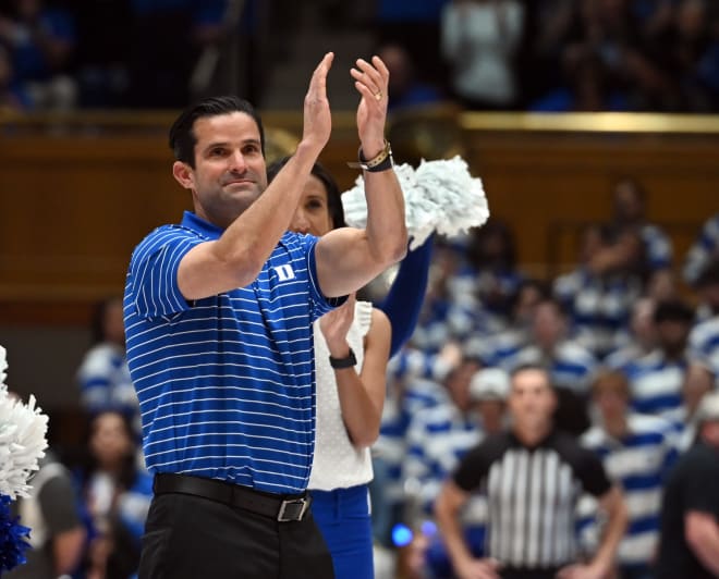 Manny Diaz is introduced during the first half of Duke's game against Charlotte. 