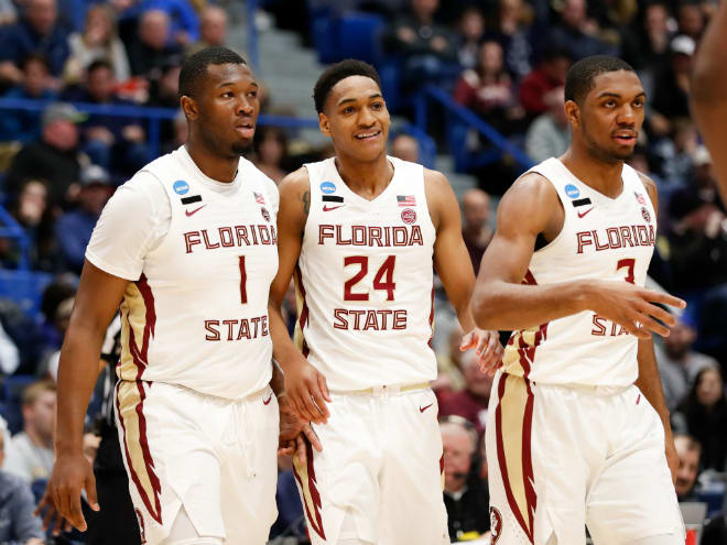 Florida State Seminoles (L-R) Raiquan Gray, Devin Vassell, and Trent Forrest react during a timeout during a game against the Murray State Racers in the 2019 NCAA Tournament at XL Center.