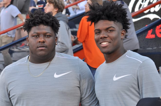 IMG Academy teammates Cesar Ruiz (left) and Tre McKitty were in Auburn on official visits.