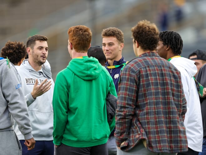 From left to right: Offensive coordinator Tommy Rees, recruits Jack Larsen, CJ Carr, Owen Wafle and Cam Williams. 