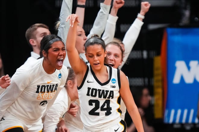 Gabbie Marshall celebrates after draining a 3-pointer in Iowa's Round Two win over Georgia in the NCAA Tournament.