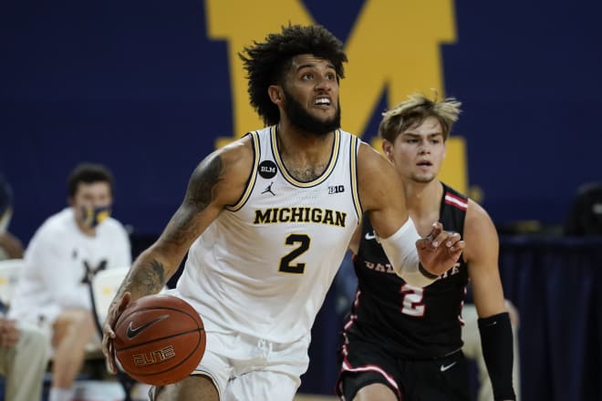 Michigan senior forward Isaiah Livers and his teammates will have to wait another week before returning to the court.