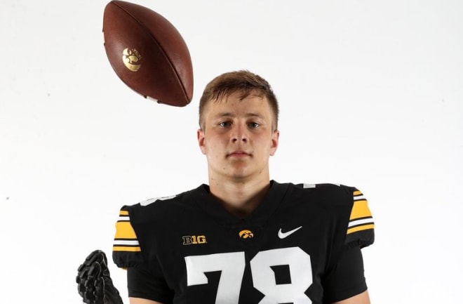 Mason Richman hopes to get a head start on the transition to offensive tackle by enrolling early at Iowa.