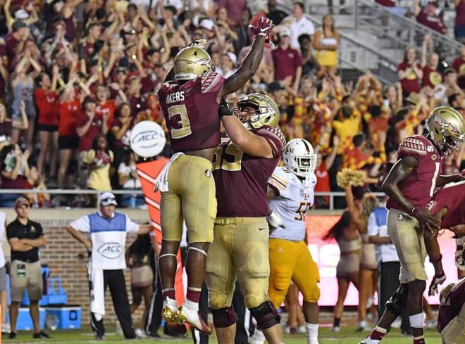 Cam Akers celebrates his touchdown in ovetime on Saturday night vs. Louisiana-Monroe. 