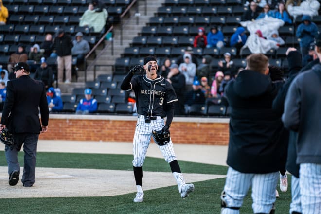 Wake Forest's Adam Tellier celebrates after hitting a home run against Duke. 