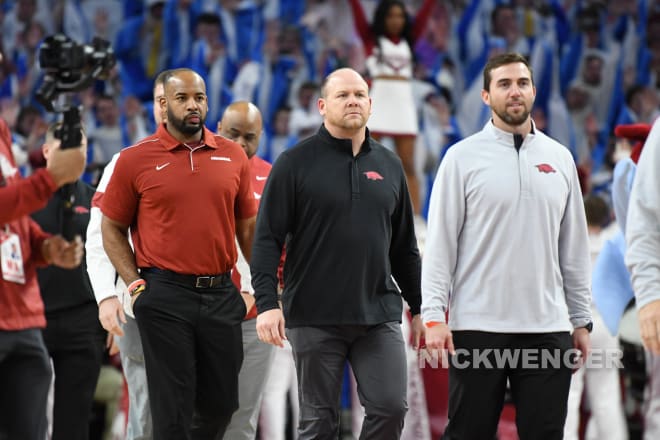 Barry Odom (middle) has received a pay raise before ever coaching a game at Arkansas.