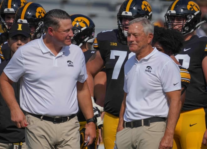 Iowa announced this week that offensive coordinator Brian Ferentz (left) would not be back next season.