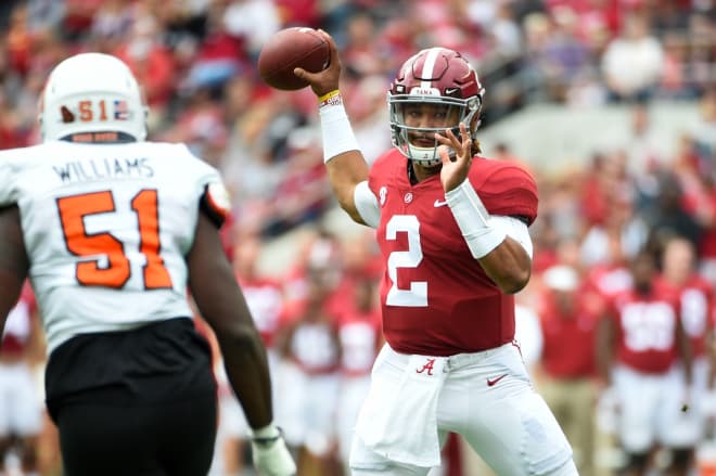 Alabama Crimson Tide quarterback Jalen Hurts (2) throws the ball against Mercer Bears linebacker Kyle Williams (51) during the first quarter at Bryant-Denny Stadium. Photo | USA Today