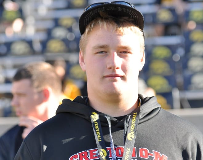 Offensive lineman Trevor Downing plans to visit Iowa's junior day in March.
