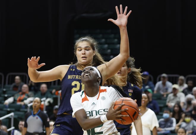 Notre Dame forward Maddy Westbeld (top) defends against Miami guard Ja'Leah Williams during ND's 66-63 road win on Thursday night.