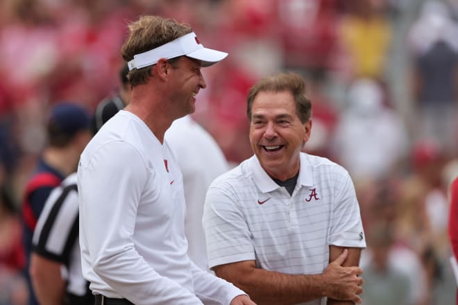 Mississippi Rebels head coach Lane Kiffin talks with Alabama Crimson Tide head coach Nick Saban before the start of an NCAA college football game at Bryant-Denny Stadium. Photo | Butch Dill-USA TODAY Sports