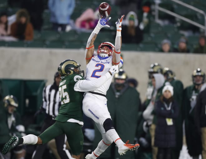 Boise State wide receiver Khalil Shakir, right, pulls in a pass over Colorado State cornerback Keevan Bailey in the second half of an NCAA college football game Friday, Nov. 29, 2019, in Fort Collins, Colo. Boise State won 31-24.