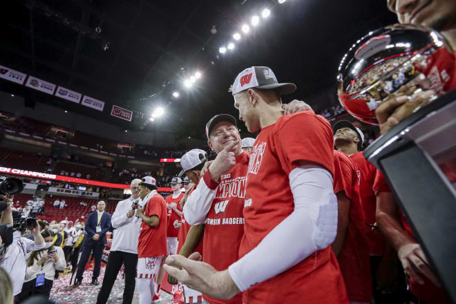 Brad Davison and Greg Gard share a moment following Wisconsin's victory over Purdue March 1, clinching a share of the Big Ten title.