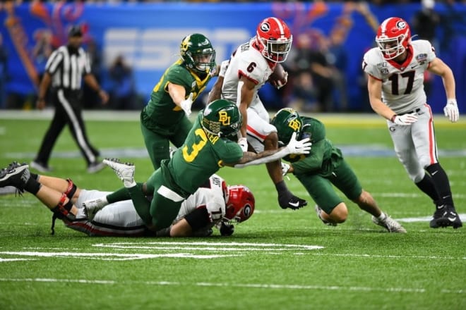 Kenny McIntosh carries the ball against Baylor in the Sugar Bowl. 