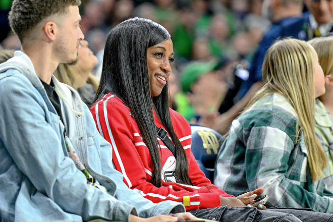 Former Notre Dame All-American and current WNBA star Jackie Young takes in the ND-NC State game on Thursday night.