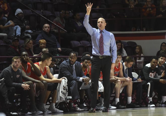  Saint Francis head coach Rob Krimmel signals for a play during the school's Nov. 24 game against Virginia Tech at Cassell Coliseum. The Red Flash are, who finished the regular season with an 18-14 overall record, are Indiana's NIT-opening opponent Tuesday 