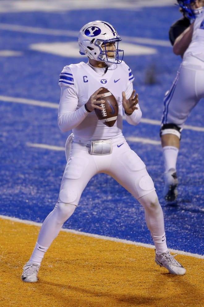 BYU quarterback Zach Wilson (1) looks for a receiver during the first half of the team's NCAA college football game against Boise State on Friday, Nov. 6, 2020, in Boise, Idaho. (AP Photo/Steve Conner)