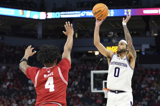 A heroic 29-point game from Boo Buie couldn't beat a red-hot Wisconsin squad.