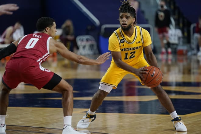 Michigan Wolverines basketball fifth-year senior guard Mike Smith notched 10 assists against Minnesota.