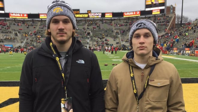 Noah Harvey, left, with his younger brother, Owen, at Iowa on Friday.