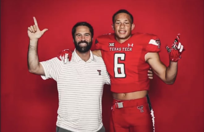 Miquel Dingle Jr with Texas Tech linebackers coach Josh Bookbinder