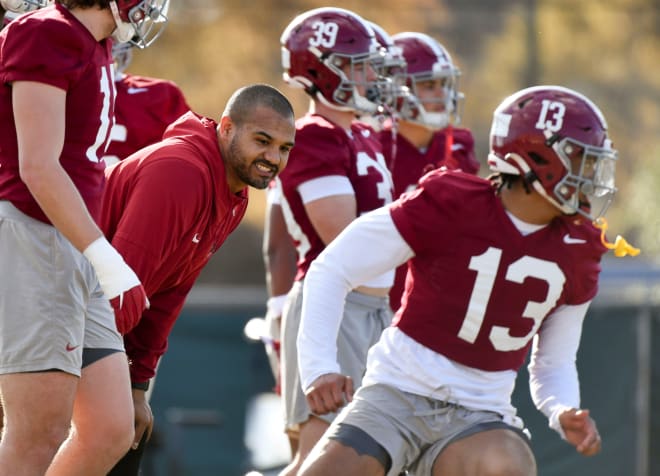 Mar 6, 2024; Tuscaloosa, Alabama, USA; Outside linebackers coach Christian Robinson works with his players during practice for the Alabama Crimson Tide football team Wednesday. | Photo: Gary Cosby Jr.-Tuscaloosa News